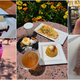 Collage of images of signature cocktails, fancy desserts, breakfast platters, and a piece of wagyu beef